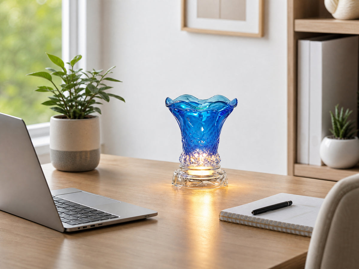 Crystal glass oil warmer on home office desk
