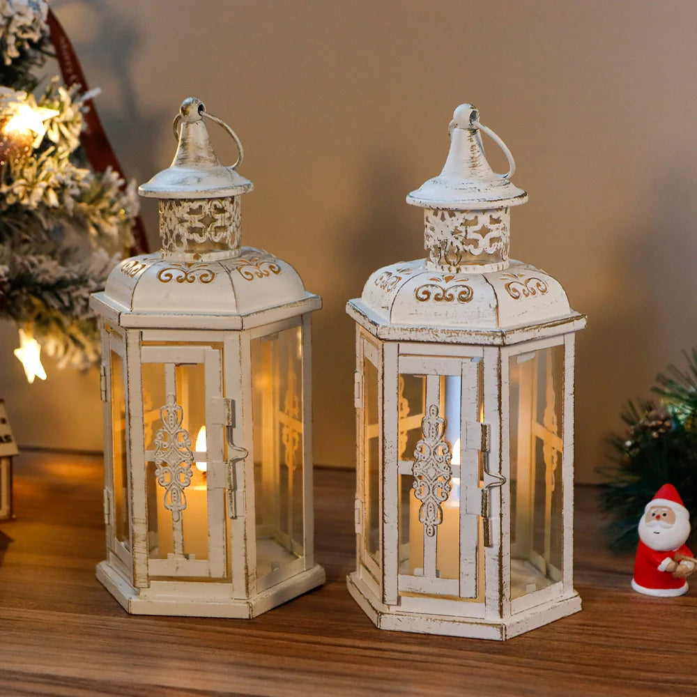 Set of two white vintage hanging lanterns displayed with seasonal decor