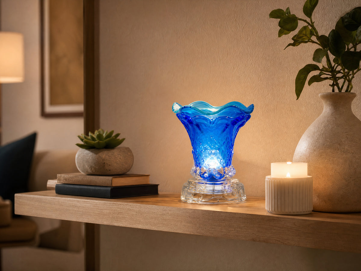 Crystal glass oil warmer on living room shelf