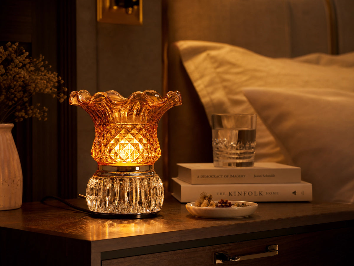 Crystal Glass Electric Fragrance Oil Warmer in Amber on bedroom nightstand