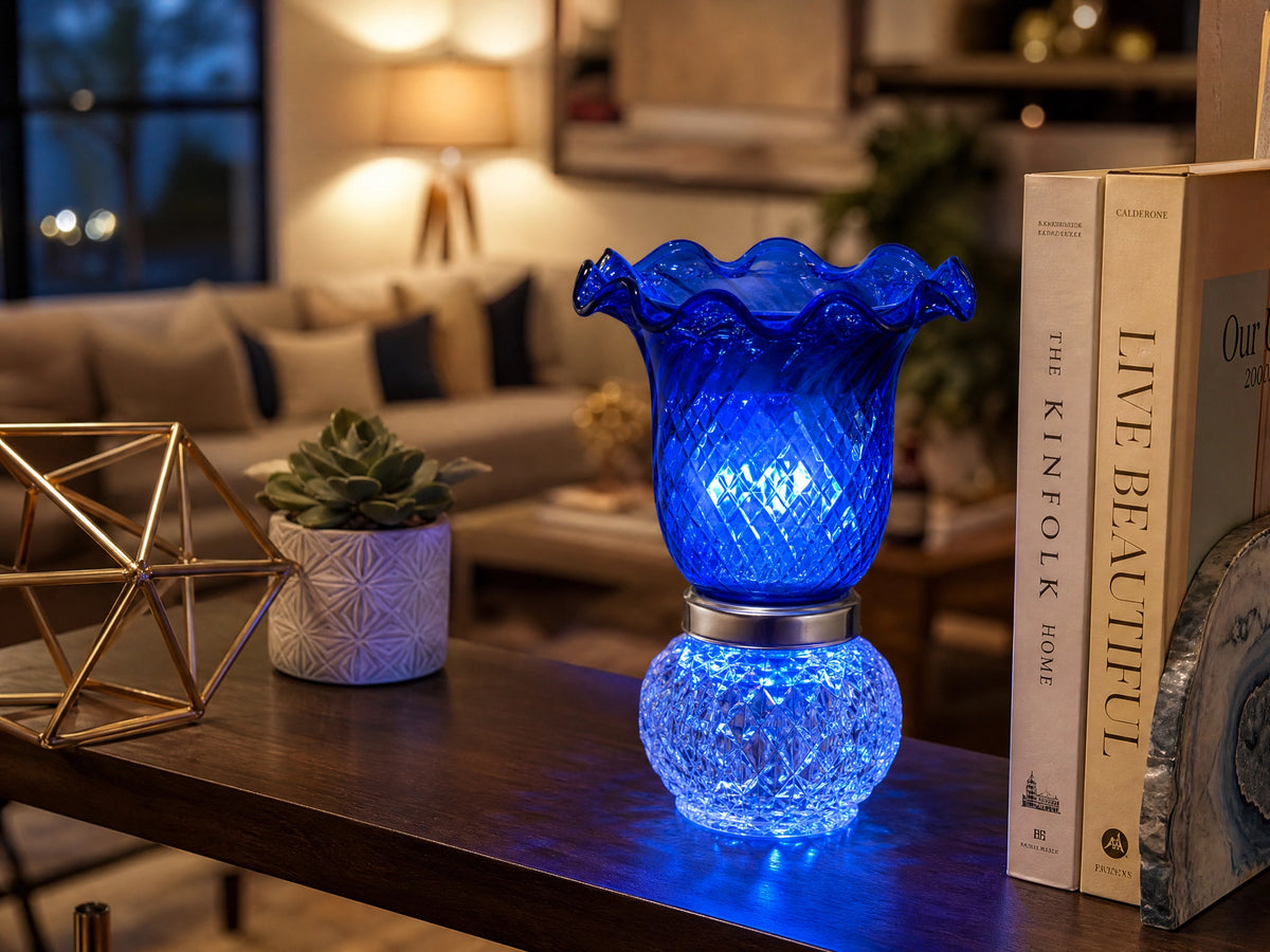 Crystal Glass Electric Fragrance Oil Warmer in Blue on living room shelf
